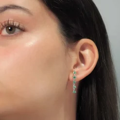 Pendientes colgantes de diamantes y esmeraldas