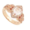 Sortija con topacio central y diamantes