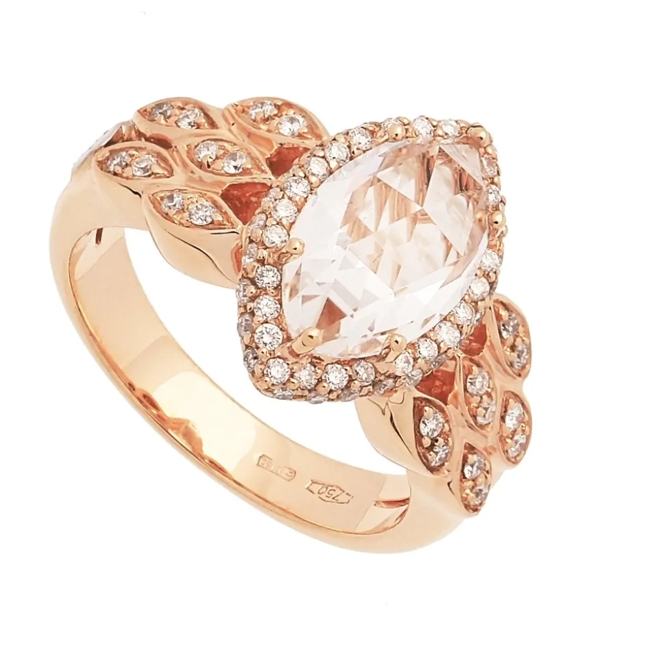 Sortija con topacio central y diamantes