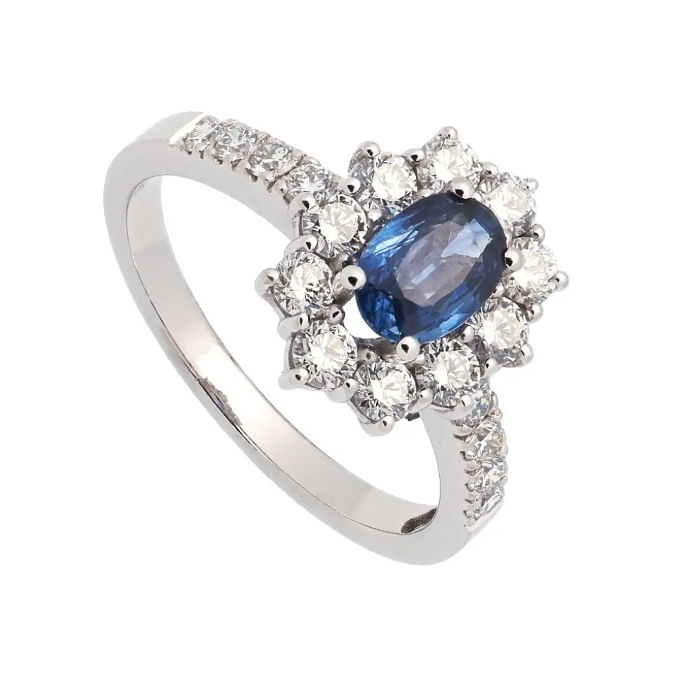 Sortija con zafiro central y diamantes