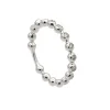 Sortija de bolas con diamantes